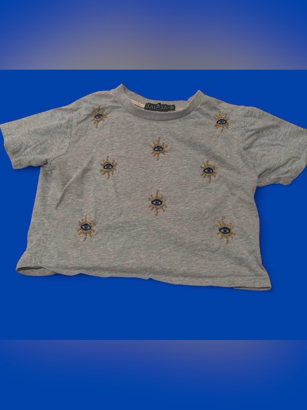 Baldwin Gray Crop Tee with Gold & Blue Embroidered Eye Motifs